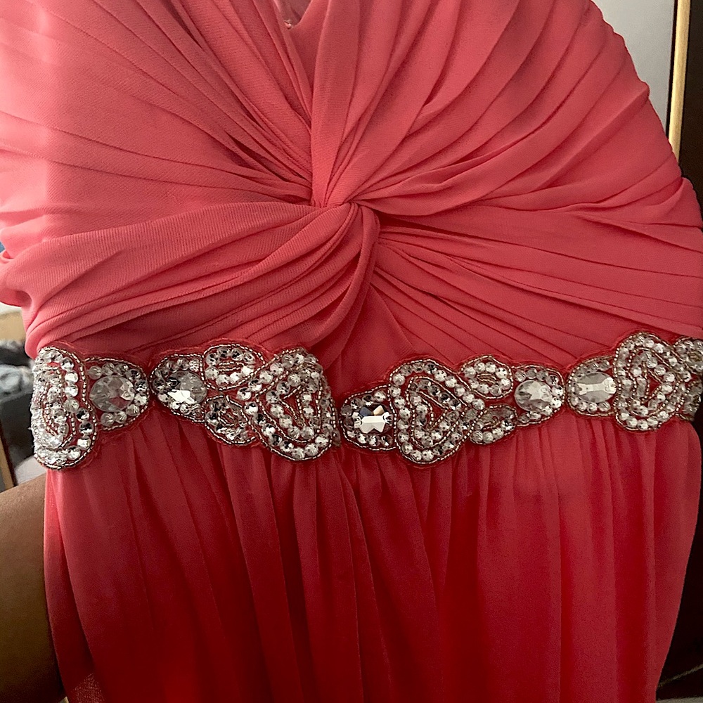 Pink full length dress with crystal accents.